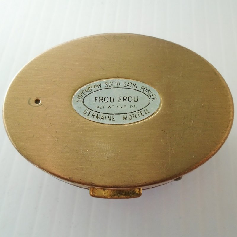 Germaine Monteil compact with mirror, puff, and powder. Vintage, possibly from the 1940s. Excellent, almost like new condition. Estate purchase.