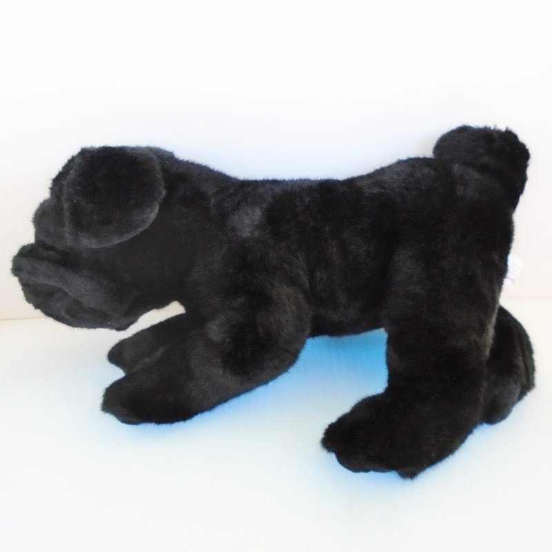 Purebred plush Pug about 12 inches tall made by Animal Alley and was offered exclusively by Toys-R-Us. Dates to around the year 2000.