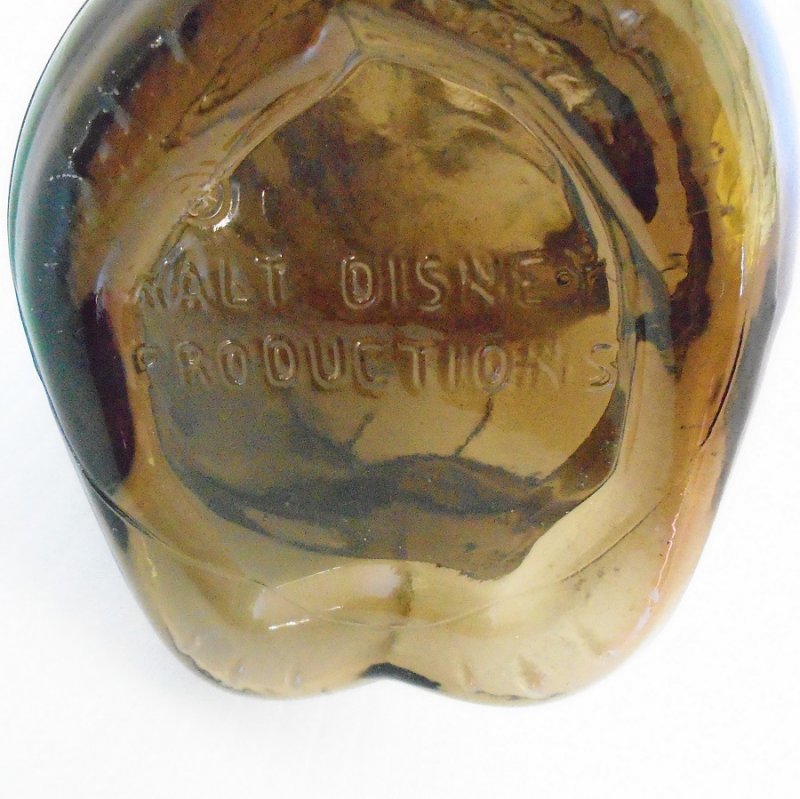 Walt Disney Productions Mickey Mouse Club Glass Bank. Should date to between 1955 to 1958. Dark brown heavy glass.