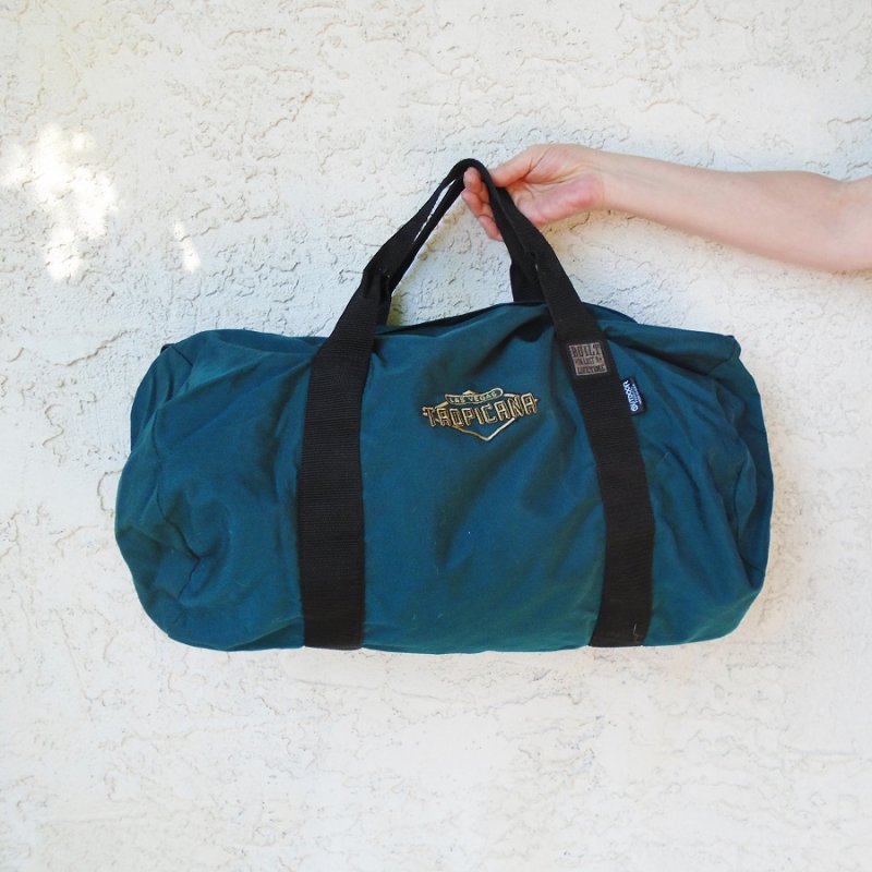 Tropicana Hotel Casino Las Vegas Duffle bag. Teal in color. Measures approximately 23x18x12 inches. Looks to be unused.