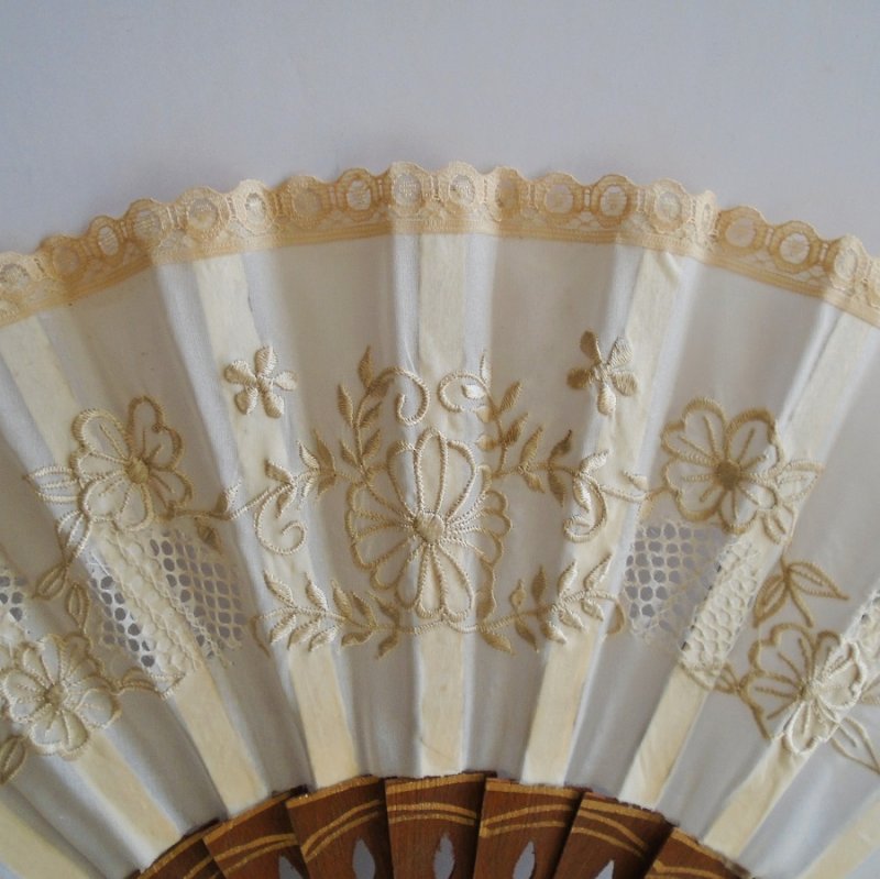 Early 1970s hand fan. Souvenir of Portugal. Floral Motif. Use as intended, or as wall art. Never displayed. From Beverly Hills estate.
