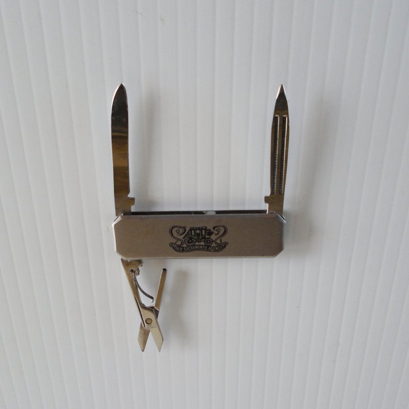 Barlow pocket knife. 2 blades plus scissors. Stagecoach logo, possibly Wells Fargo Bank. Estimated 1980s - 1980s. Estate purchase.