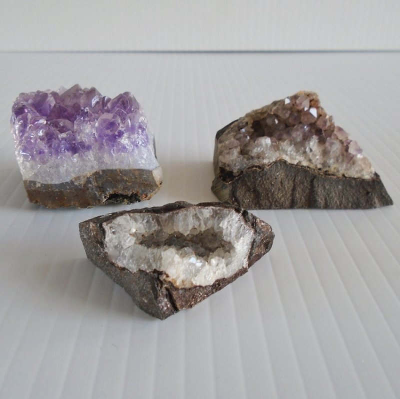 Amethyst geodes. Quantity of 3. If round, 2 of the 3 would be golf ball size, the 3rd is a little smaller. Estate purchase. 