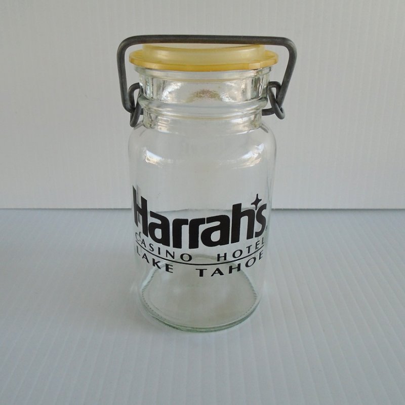Lake Tahoe Nevada Harrah's Casino Hotel flip top jar. Clear glass with Harrah's logo. 5 by 2.5 inches. Excellent condition, estate purchase.