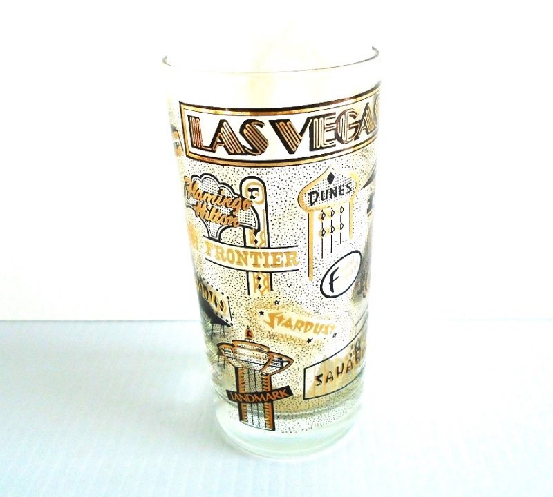 Las Vegas casinos drinking glass. Features closed casinos Aladdin, Landmark, Mint, Showboat, Stardust and others. Pre 1988. Never used, displayed only