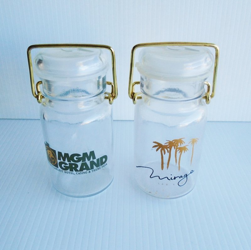 MGM Grand and Mirage Hotel Casino Las Vegas flip top jars. Vintage, but new condition. 