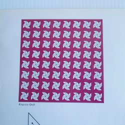 '.Quilt Pattern titled Pinwheels.'