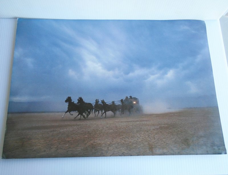 Wells Fargo Bank action poster featuring horses and stagecoach racing across the plains. 14 by 20 inch. Ready to frame.