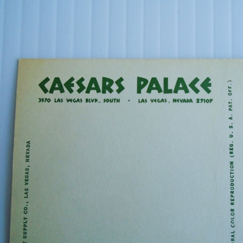 Vintage c1968 postcard of Caesars Palace Las Vegas fountains and headless winged lady statue. Postally unused.