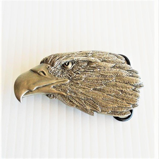Eagle’s head belt buckle from Siskiyou Buckle Company. Never used, still in original store display packaging. Dated 1989. 