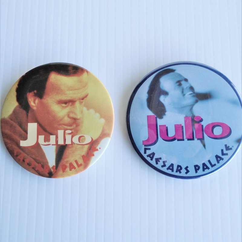 Julio Iglesias Caesars Palace Las Vegas pin back buttons. 2 different buttons. 3 inches round. 1980s