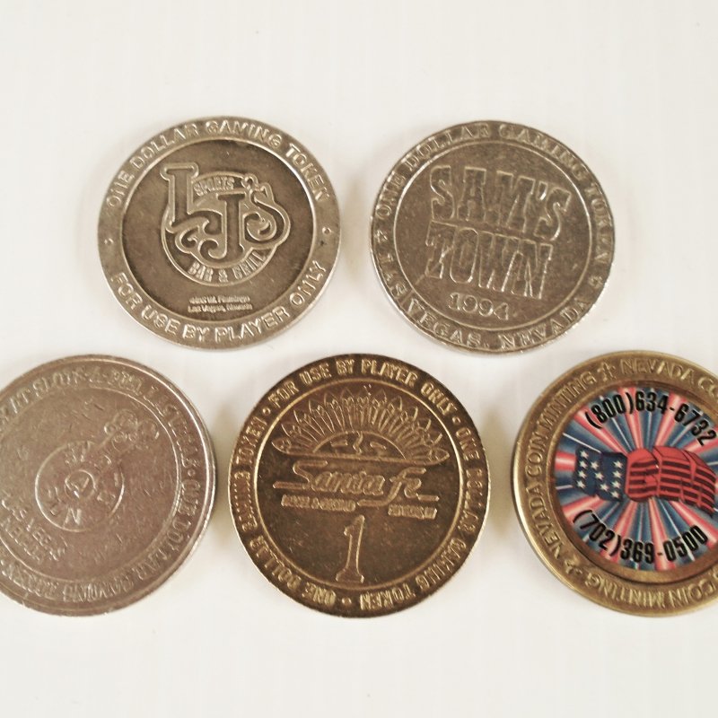 5 Las Vegas Casino $1 metal token coins. 5 different casinos. Sam’s Town, Santa Fe, Slots A Fun, others. 1980s-1990s dates.