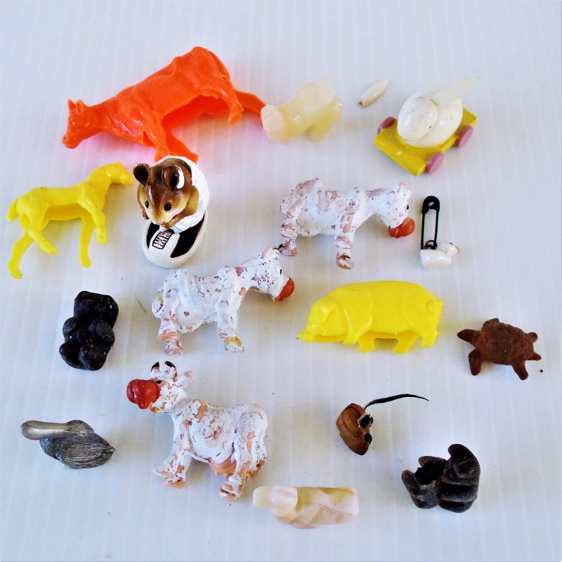 16 various barnyard animals to use with a dollhouse. Cows, ducks, pig, horse, rabbits, mice, and more. Estate purchase.