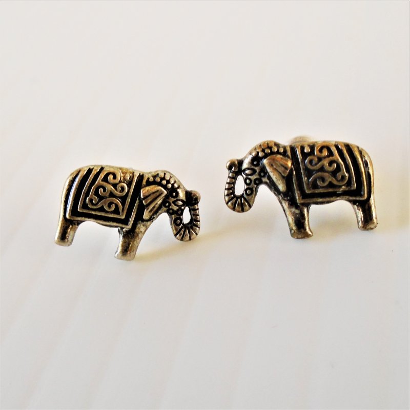 Elephant Pierced Stud Earrings, silver in color, measuring one half inch.