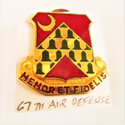 '.67th US Army Air Defense pin.'