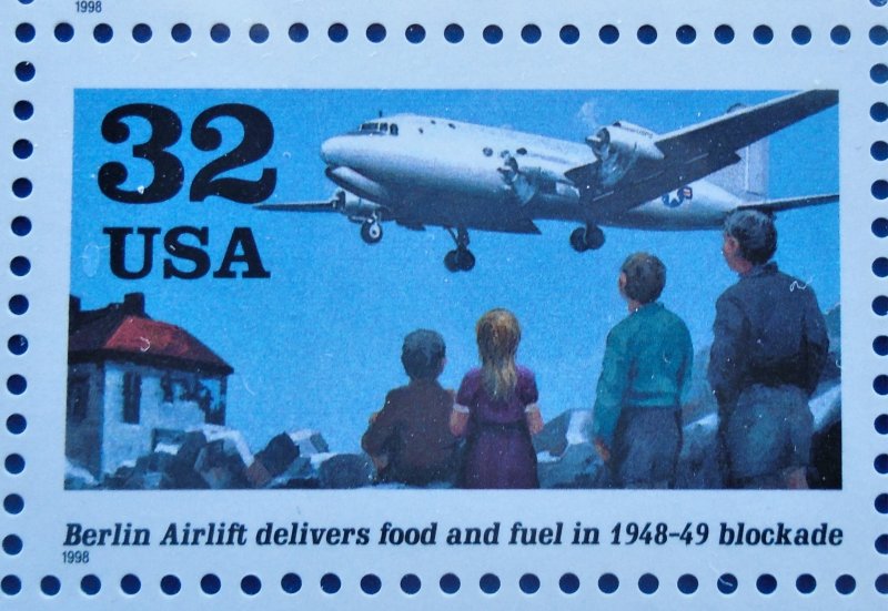 Berlin Airlift, featuring a C-54 cargo plane. USPS 445515 Stamp Sheet, 20 x .32. Sealed and in mint condition.