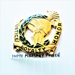 '.100th Army Military Police pin.'
