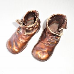 '.Antique bronzed baby shoes.'