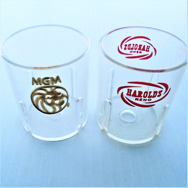 One dollar metal coin acrylic cups. From MGM and Harolds Club Reno. Pre 1995. Qty of 8 cups.