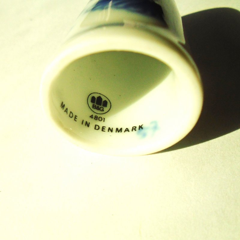 Vintage collectable thimble featuring a blue and white butterfly. Marked inside with the B&G emblem, the number 4801, and 