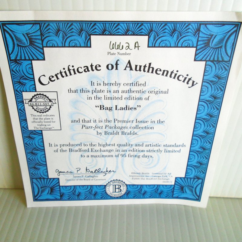 Bradford Exchange Wall Plate of cats sitting in paper shopping bags. Titled “Bag Ladies”. 9x7 inch ceramic.