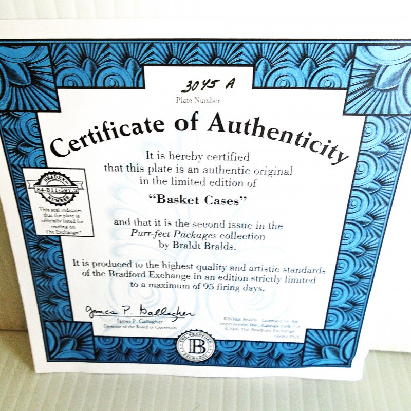 Bradford Exchange Wall Plate of cats sitting in baskets. Titled “Basket Cases”. 9x7 inch ceramic.