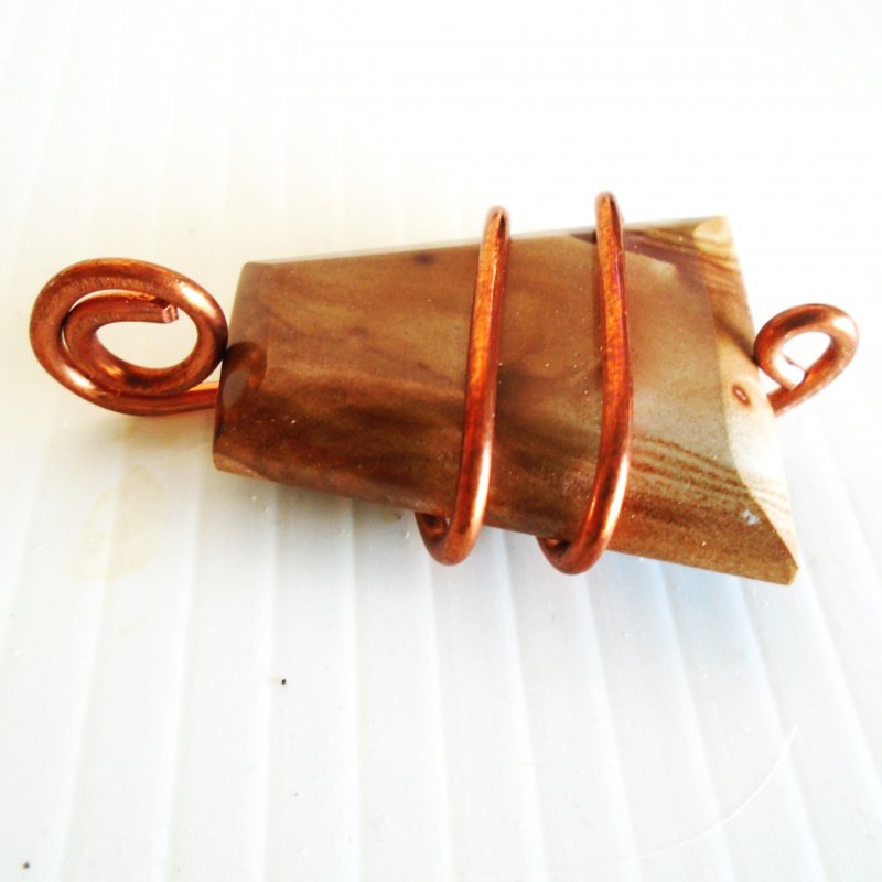 Toffee Brown Jasper pendant with copper wrapping. Triangle shaped.