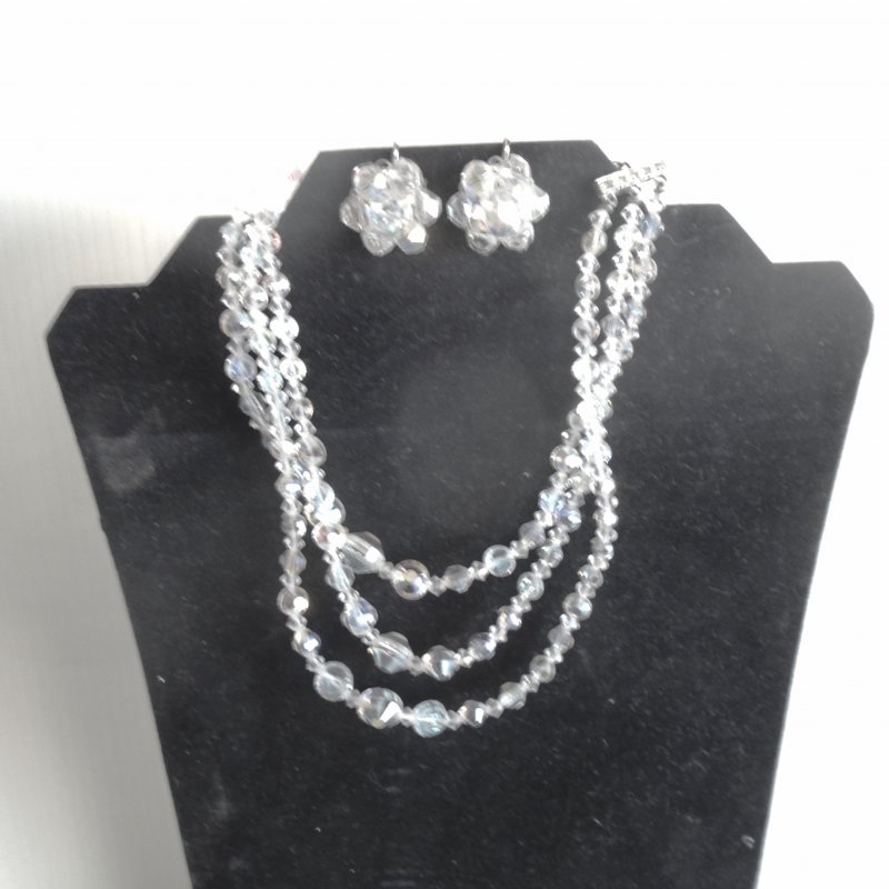 Laguna 3 strand Aurora Borealis necklace with matching earrings. Dates to 1955 to 1960.