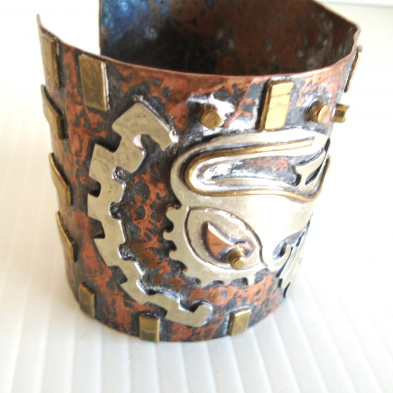 Mid Century and very bold Casa Maya Mexican Copper and Brass Cuff Bracelet featuring 2 Aztecan Eagle heads.