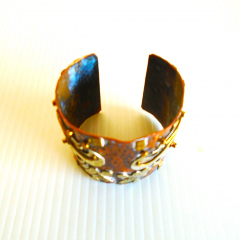 Mid Century and very bold Casa Maya Mexican Copper and Brass Cuff Bracelet featuring 2 Aztecan Eagle heads.