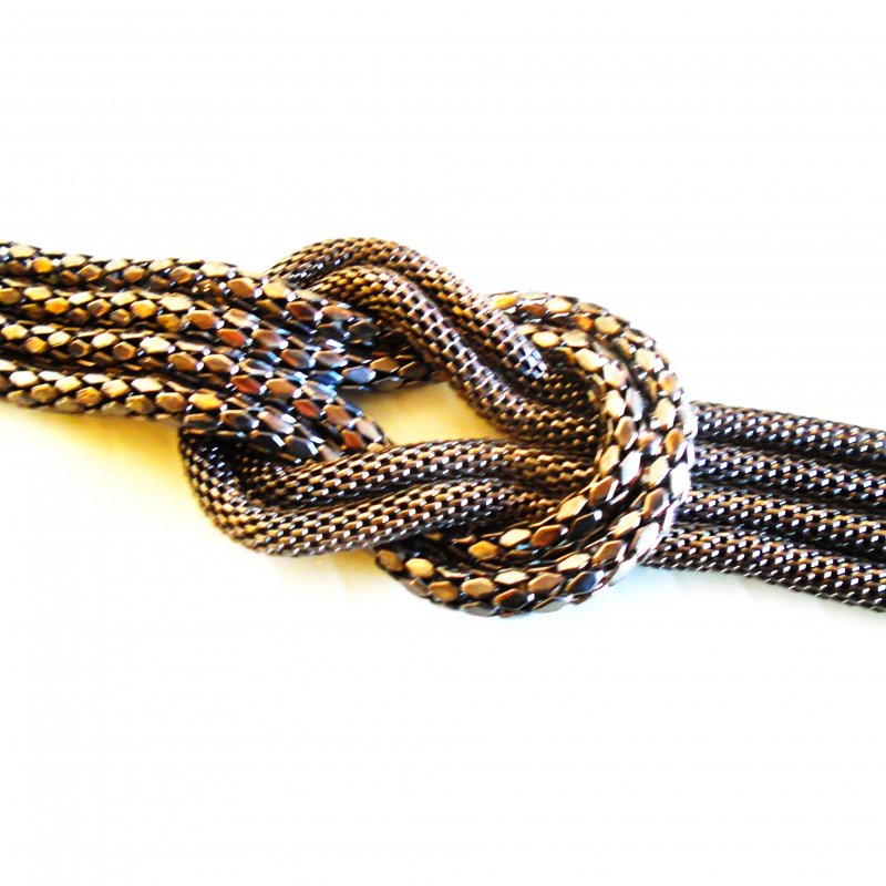 French Lovers Knot 4 strand metal knot bracelet with extender. 6.75 �