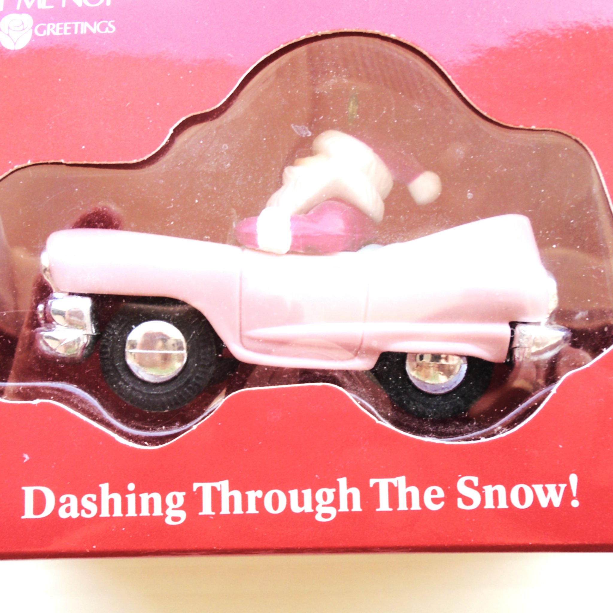 American Greetings Santa in a Pink Cadillac ornament titled Dashing Through The Snow. New, never used.
