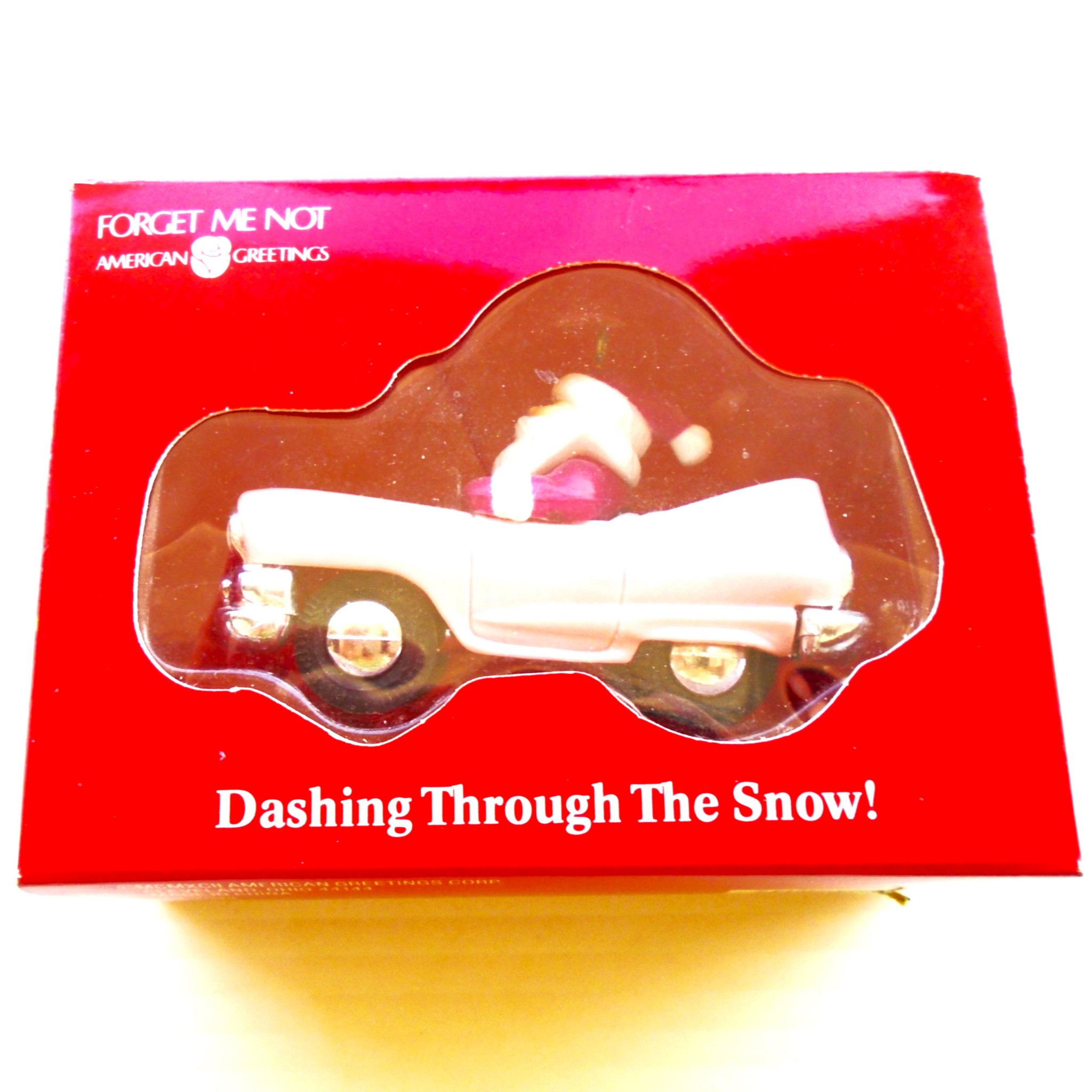 American Greetings Santa in a Pink Cadillac ornament titled Dashing Through The Snow. New, never used.