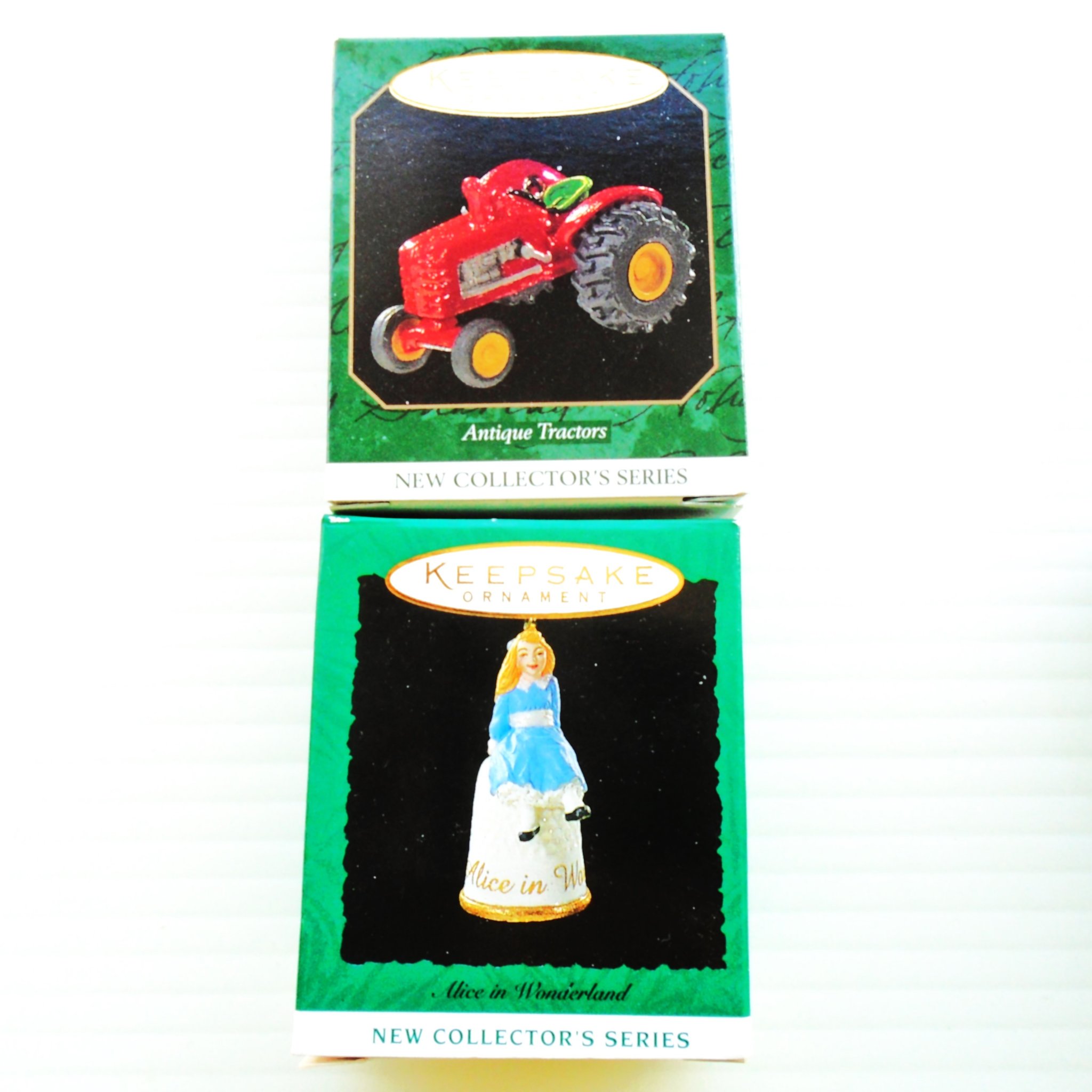 Hallmark Keepsake Ornaments, Quantity of 5 different. All in original boxes and all dated in the 1990s. All were never used. New Old Stock (NOS).