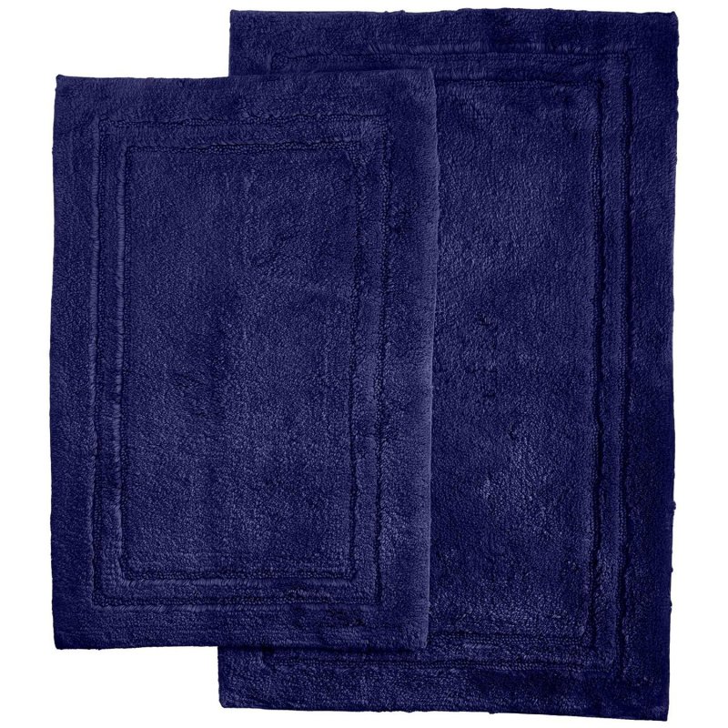 Made of combed cotton these rugs are made to last and are able to go through the washing machine without any wear and tear or fade of color. Each set comes with two bath rugs of matching color.
