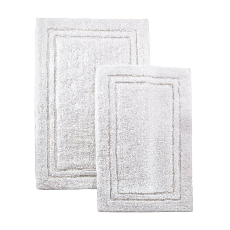 Made of combed cotton these rugs are made to last and are able to go through the washing machine without any wear and tear or fade of color. Each set comes with two bath rugs of matching color.