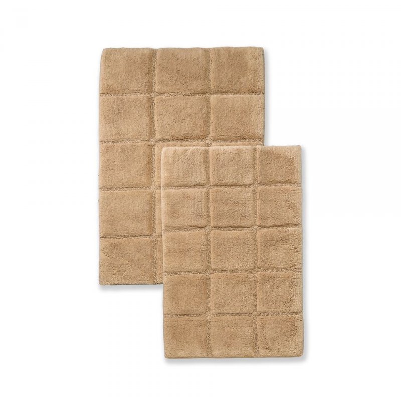 Made of combed cotton these rugs are made to last and are able to go through the washing machine without any wear and tear or fade of color. Each set comes with two bath rugs of matching color.