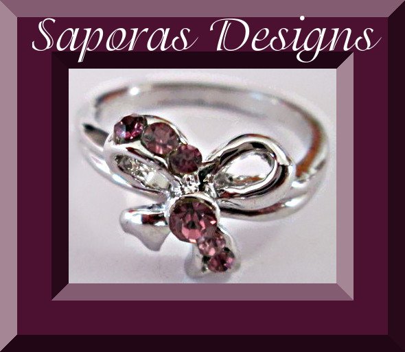 Image 0 of Size 6 Silver Tone Bow Design Ring With Pink Crystals