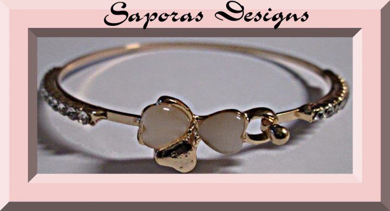 Image 0 of Gold Tone Bangle Bracelet With Bow & Heart Design White Beads & Clear Crystals