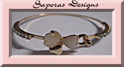 Gold Tone Bangle Bracelet With Bow & Heart Design White Beads & Clear Crystals