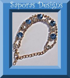 Gold Tone Bracelet With Blue & Clear Crystals