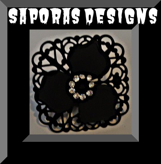 Image 0 of Size 5 & Adjustable To Fit Most Finger Black Flower Design Ring With Crystals