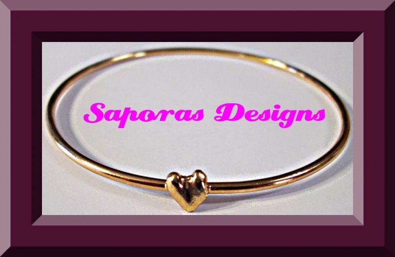 Image 0 of Gold Tone Bangle Heart Design Bracelet