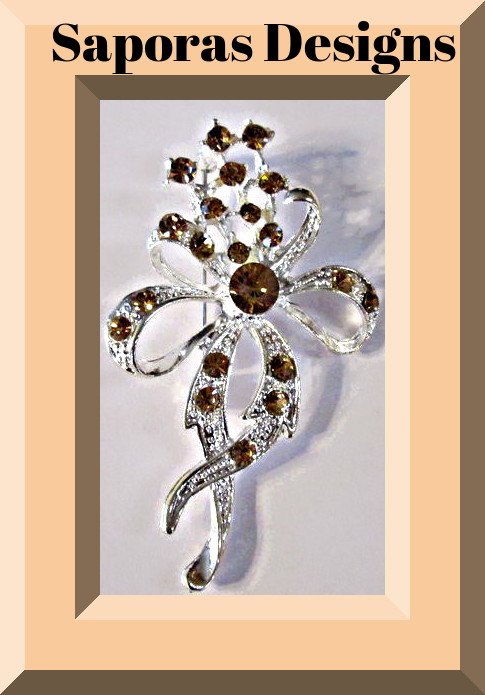 Image 0 of Silver Tone Bow Design Brooch With Brown Crystals