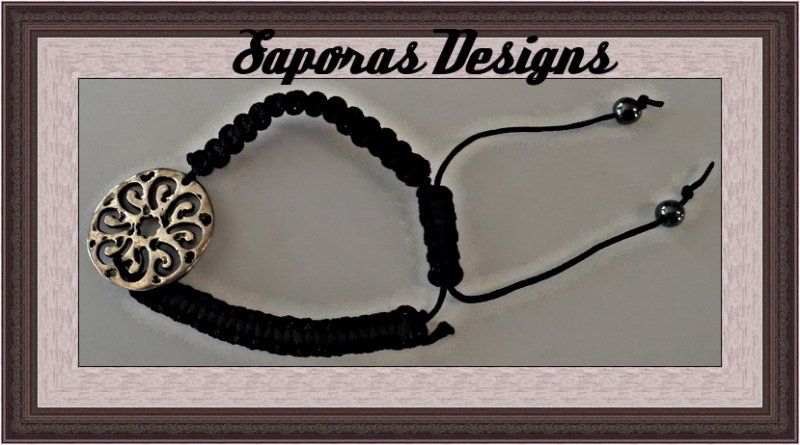 Image 0 of Handwoven Black Braided Bracelet With Silver Tone Flower Charm Adjustable To Fit