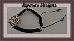 Handwoven Black Braided Bracelet With Silver Tone Flower Charm Adjustable To Fit