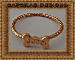Gold Tone Size 6.5 Dog Bone Design Ring With The Name Gucci