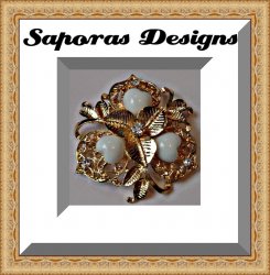 Gold Tone Flower Design Brooch With White Heart Design Beads