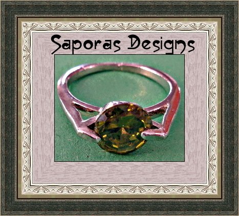 Image 0 of Size 5 Silver Tone Ring With Green Crystal
