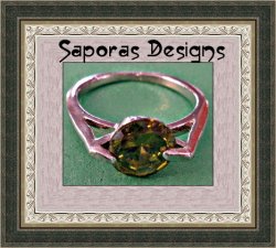 Size 5 Silver Tone Ring With Green Crystal